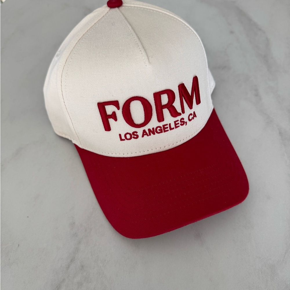 White and Red FORM by Sami Clarke Trucker Hat